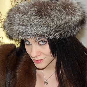 Roxy Mendez in brown mink and fox fur coat and silver fox fur hat