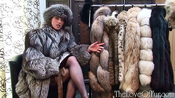 Holly Kiss shows off her rail of fur jackets wearing silver fox fur