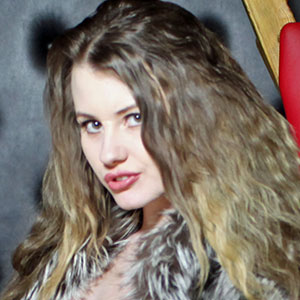 Brook Logan glamourous blonde babe model silver fox fur