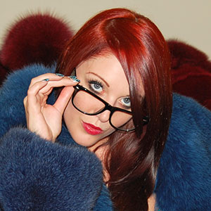 Shay Hendrix in blue fox fur jacket